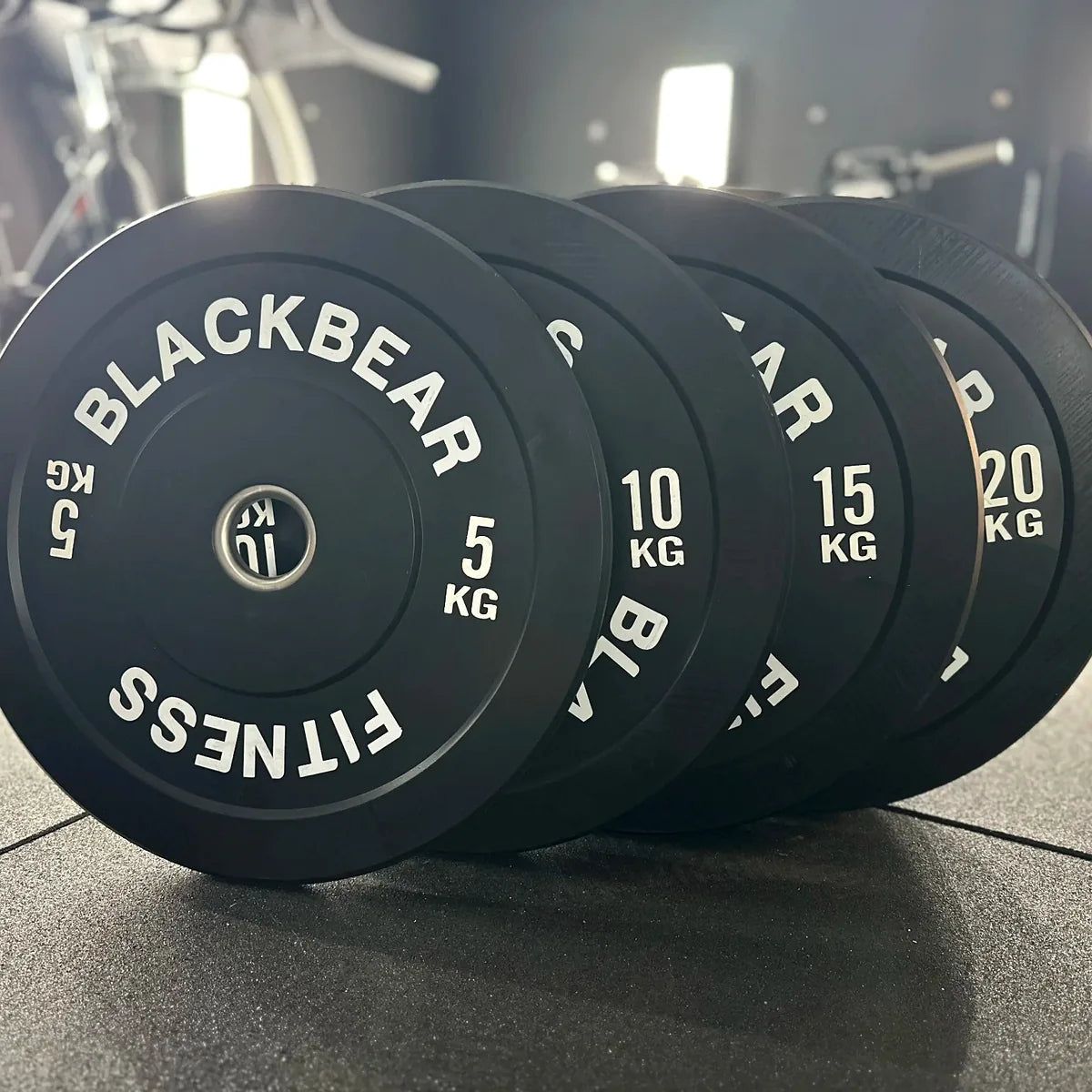 BlackBear Black Bumper Plates – full set view on barbell