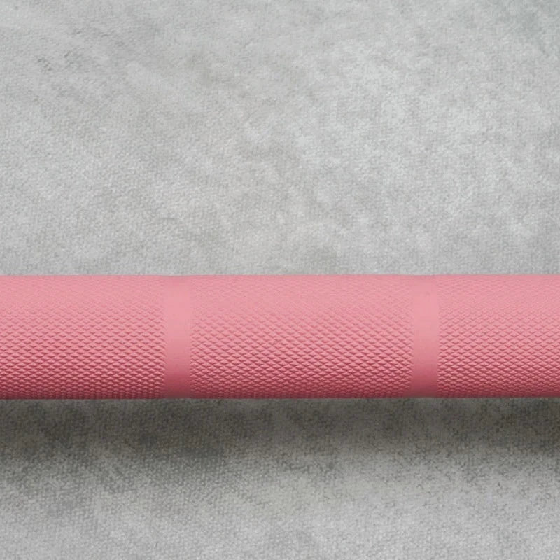 BlackBear 6ft Pink and Black Olympic Barbell — sleeve loading end studio view