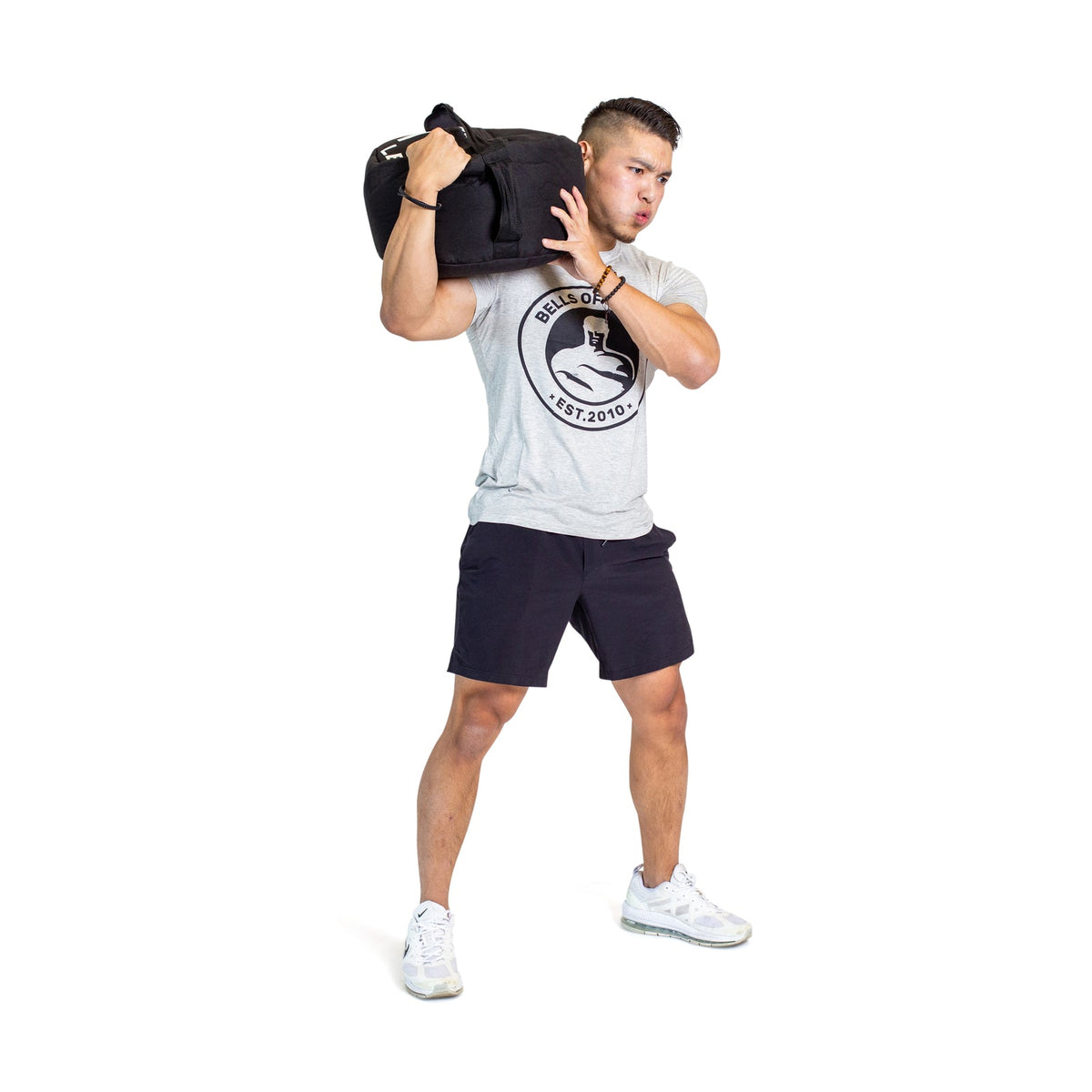 Athlete training with a Bells of Steel sandbag