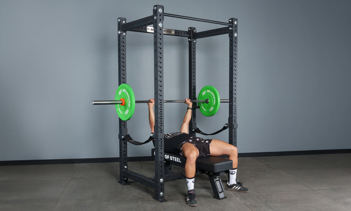 Bench pressing inside a Bells of Steel Hydra power rack