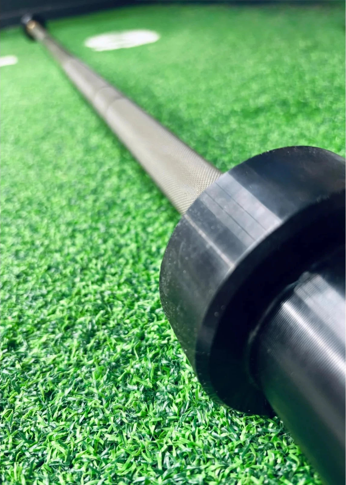 BlackBear green bar on green artificial turf - real product shot